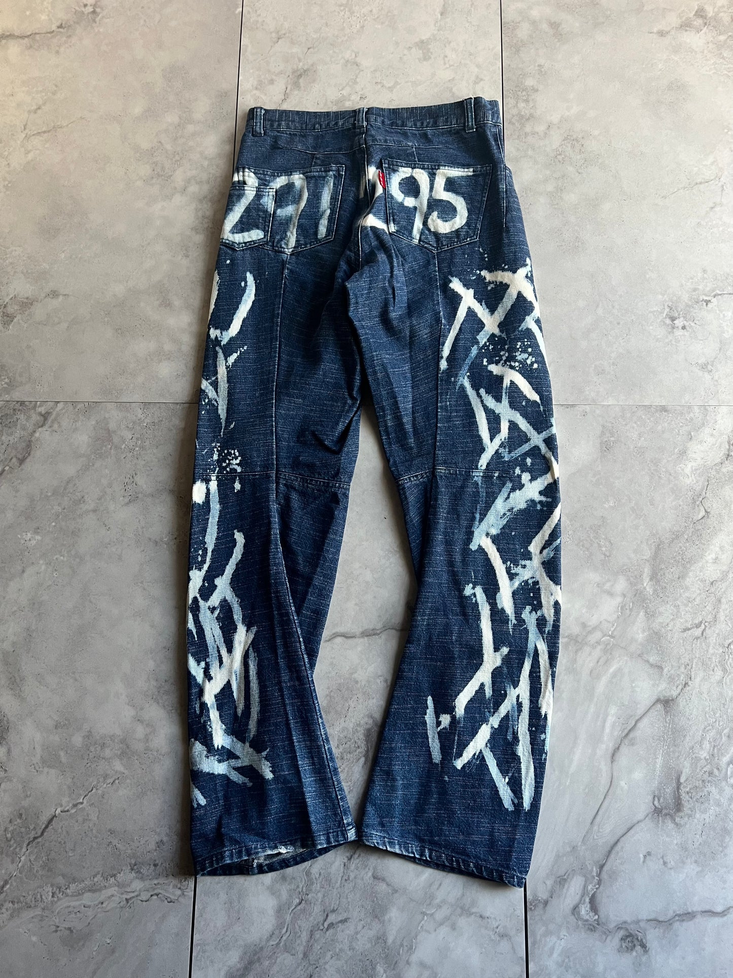 291295 Homme Paint Splatter Inverted Hem Jeans