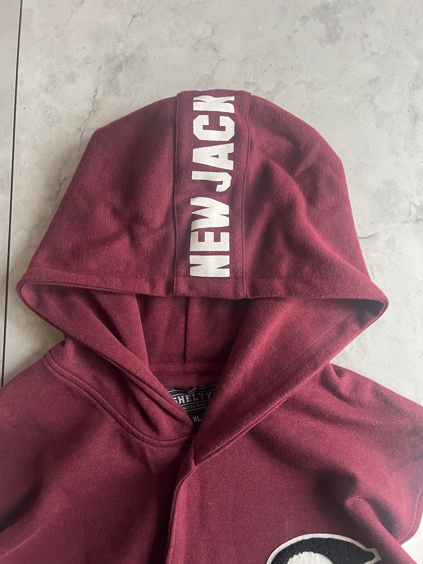 Shelty Embroidered Hooded Varsity Jacket