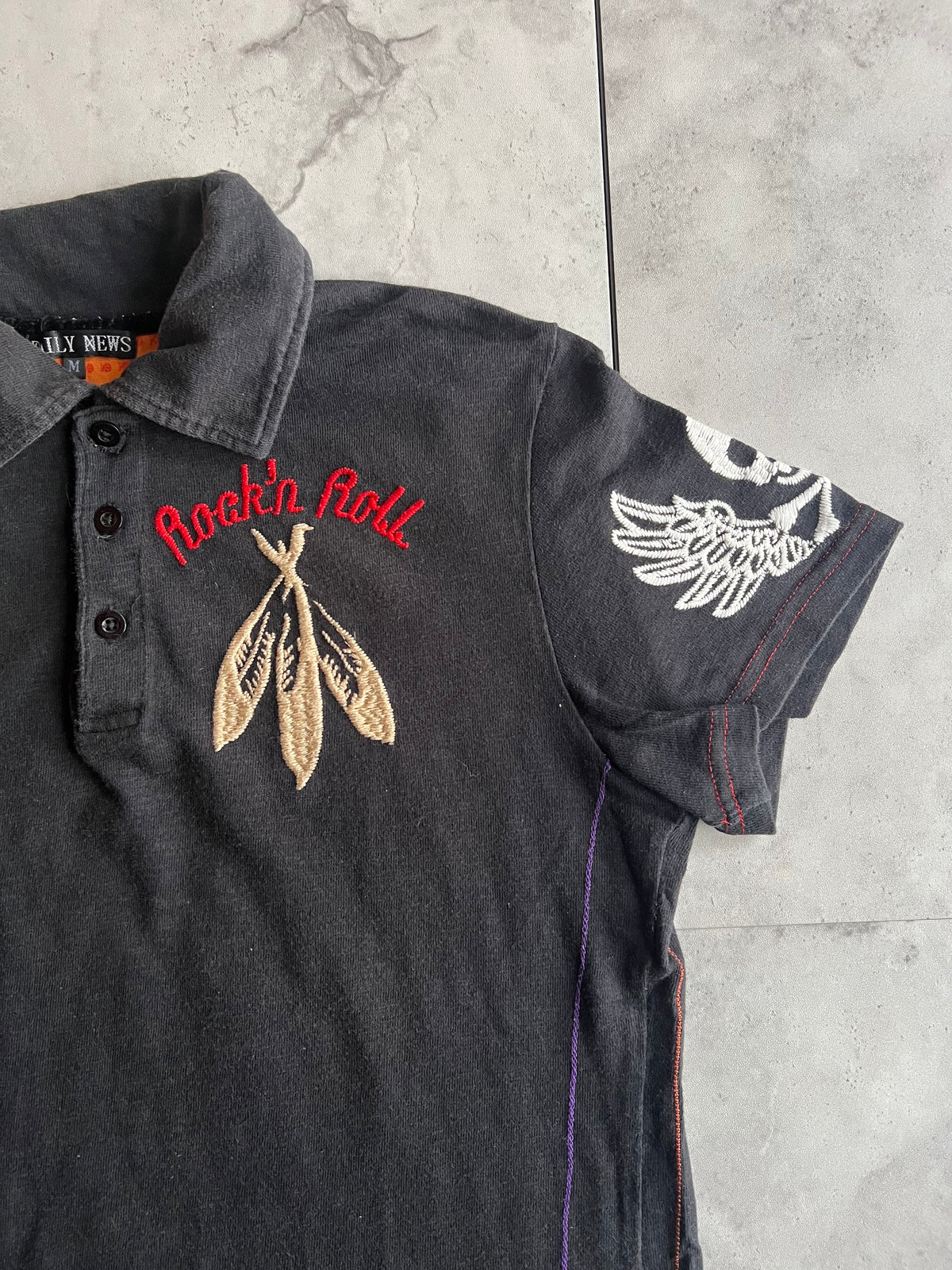 Daily News “Rock n Roll” Embroidered Polo Tee