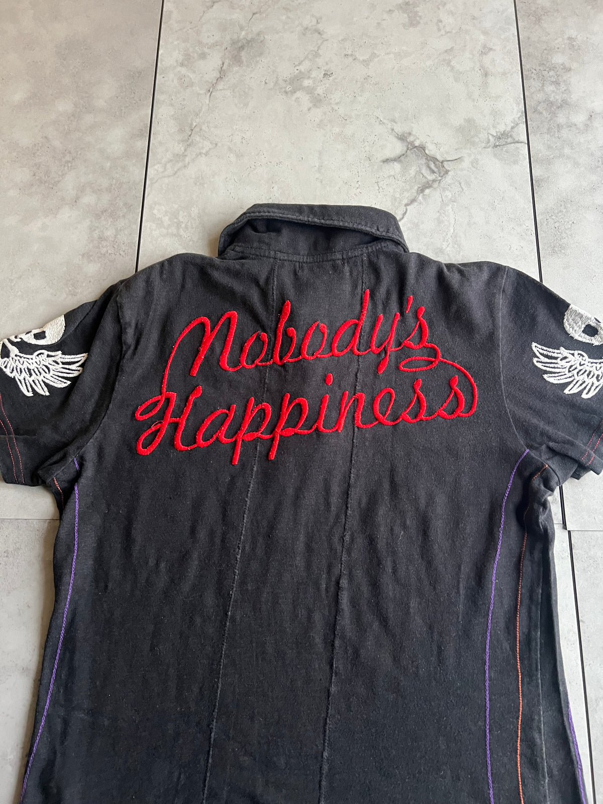 Daily News “Rock n Roll” Embroidered Polo Tee
