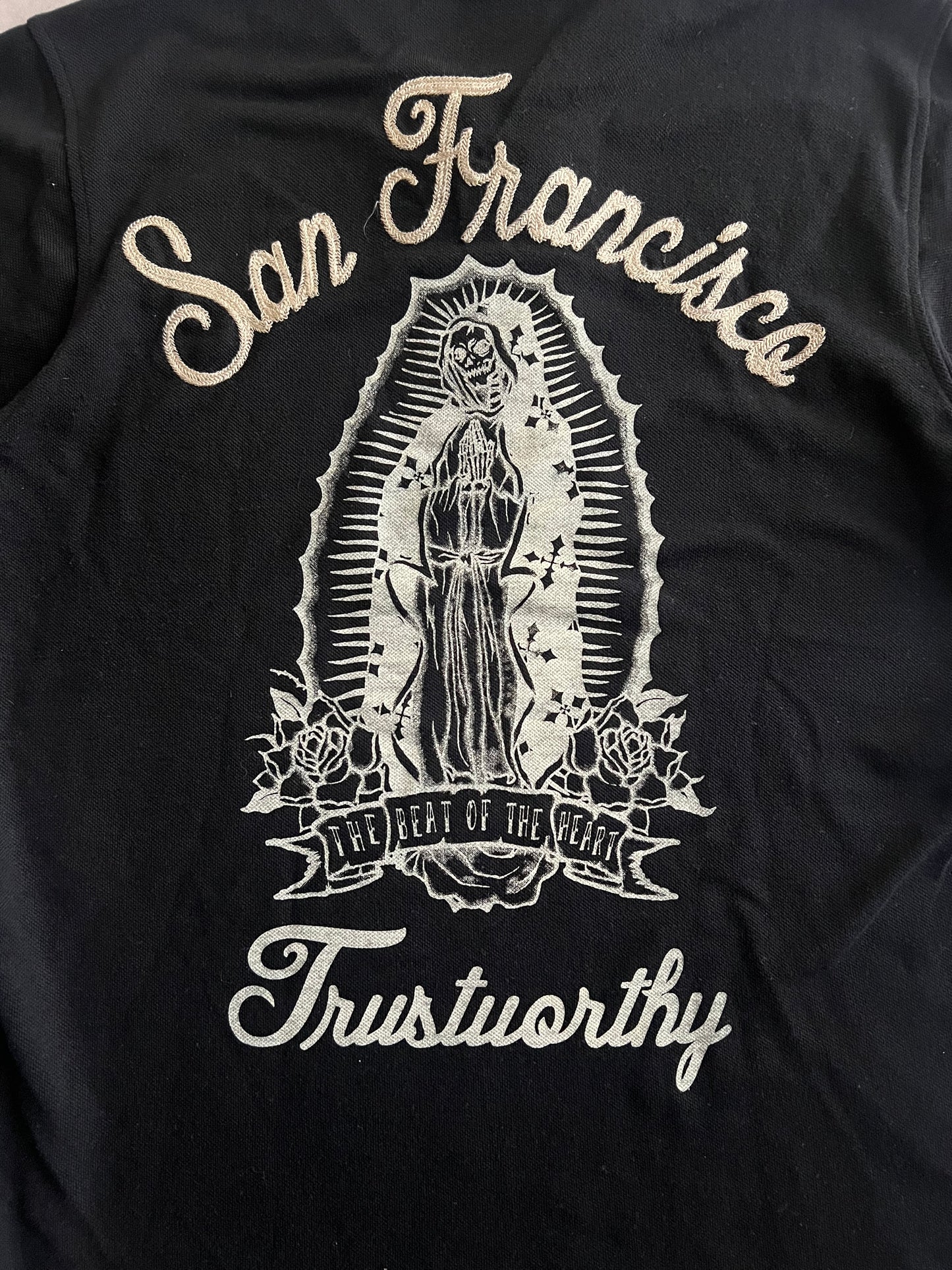 Shelty “Trustworthy” Embroidered Polo Tee