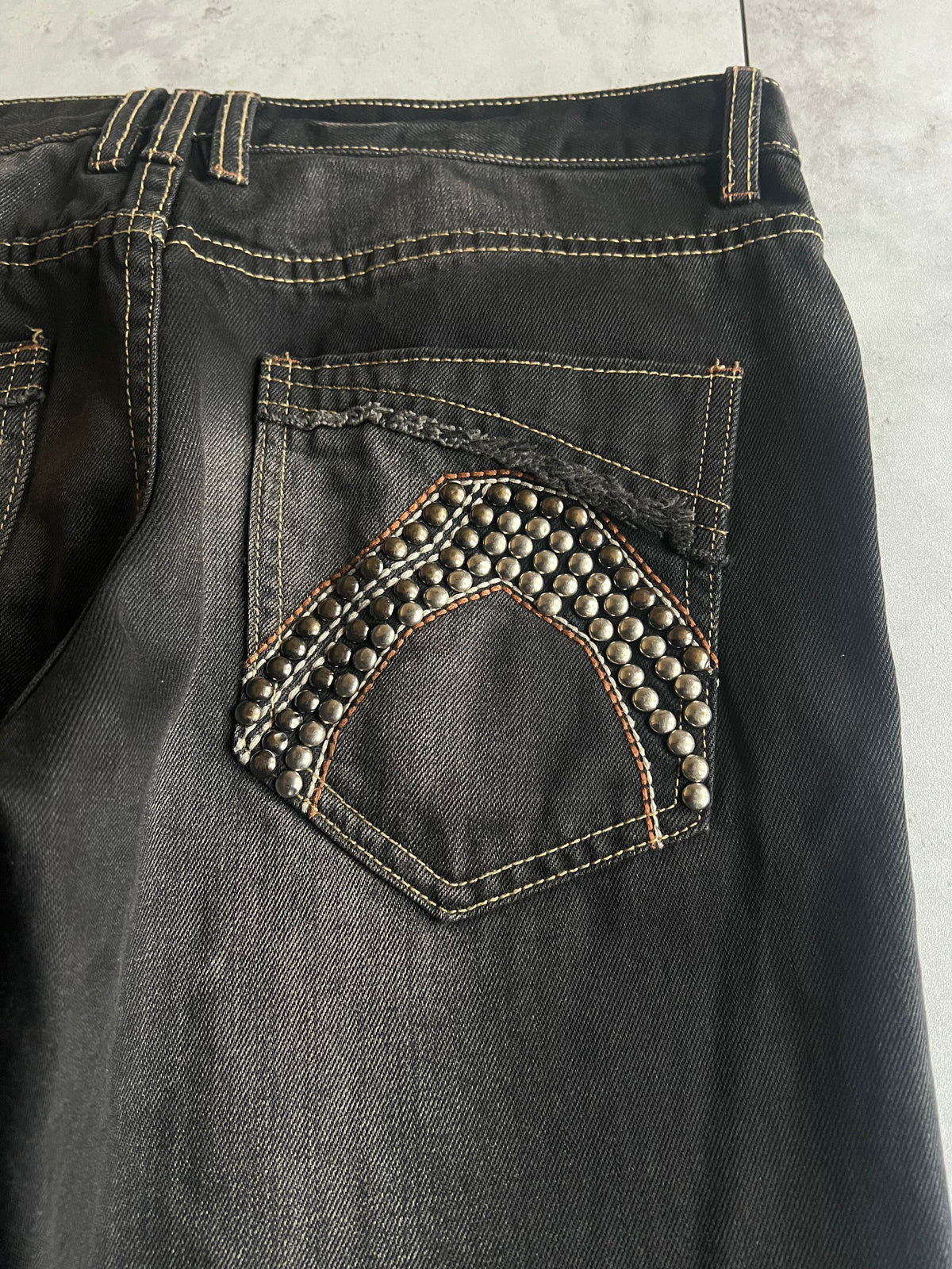 Semantic Design Studded Whisker Wash Denim