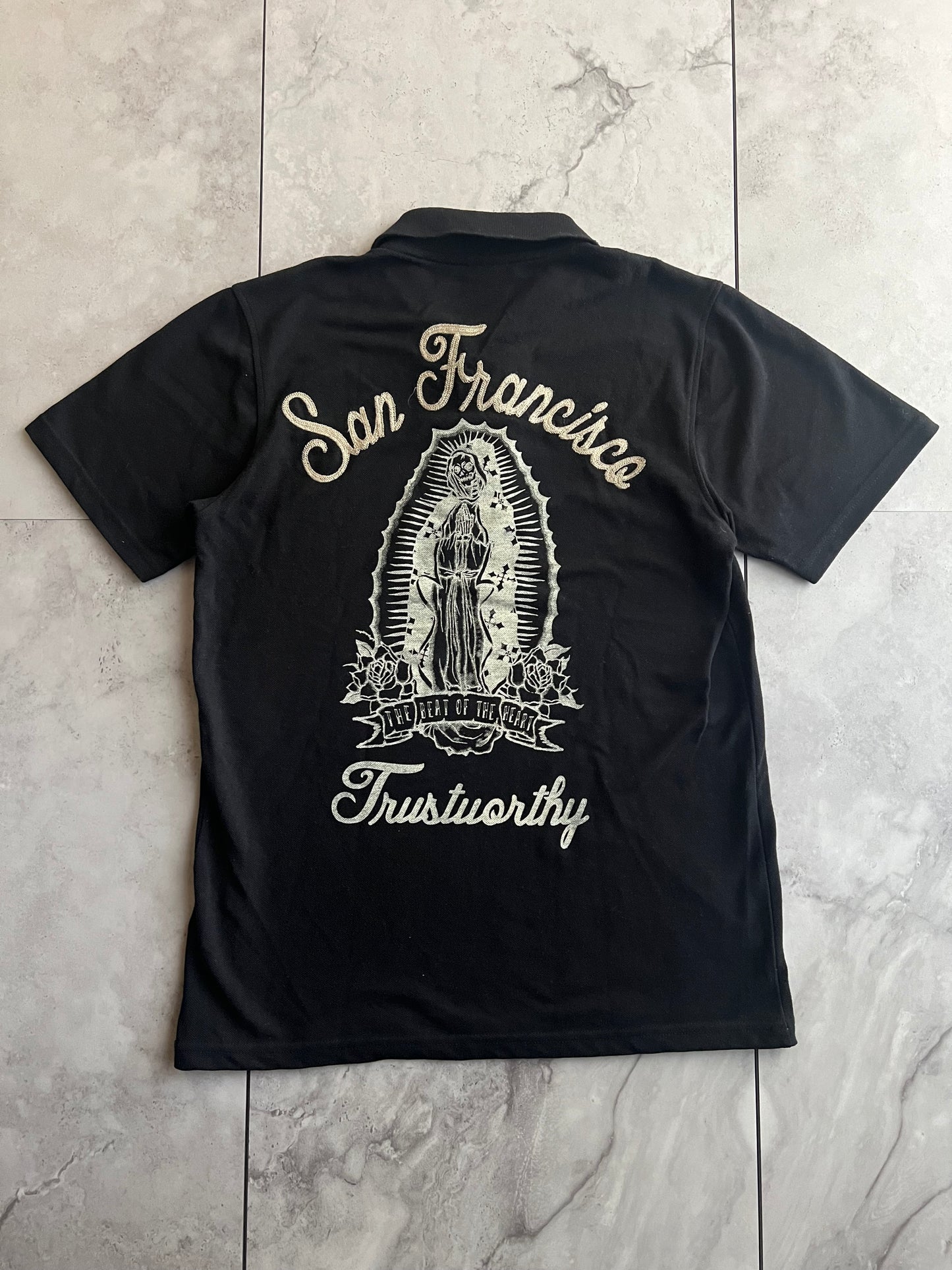 Shelty “Trustworthy” Embroidered Polo Tee