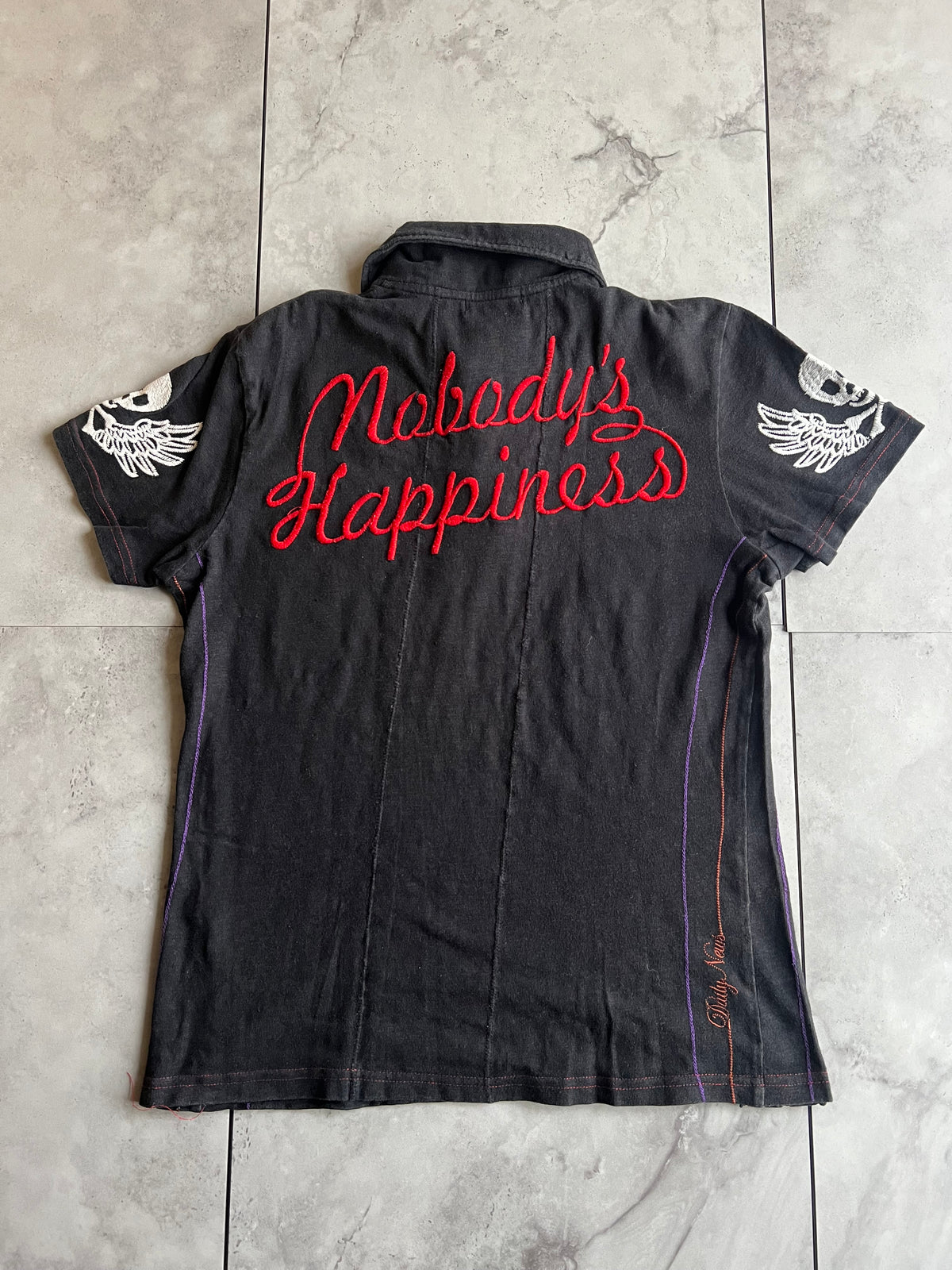 Daily News “Rock n Roll” Embroidered Polo Tee