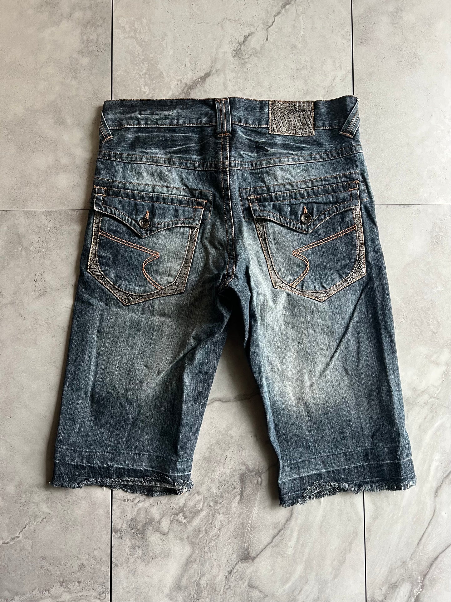 Semantic Design Studded Distressed Crocodile Shorts