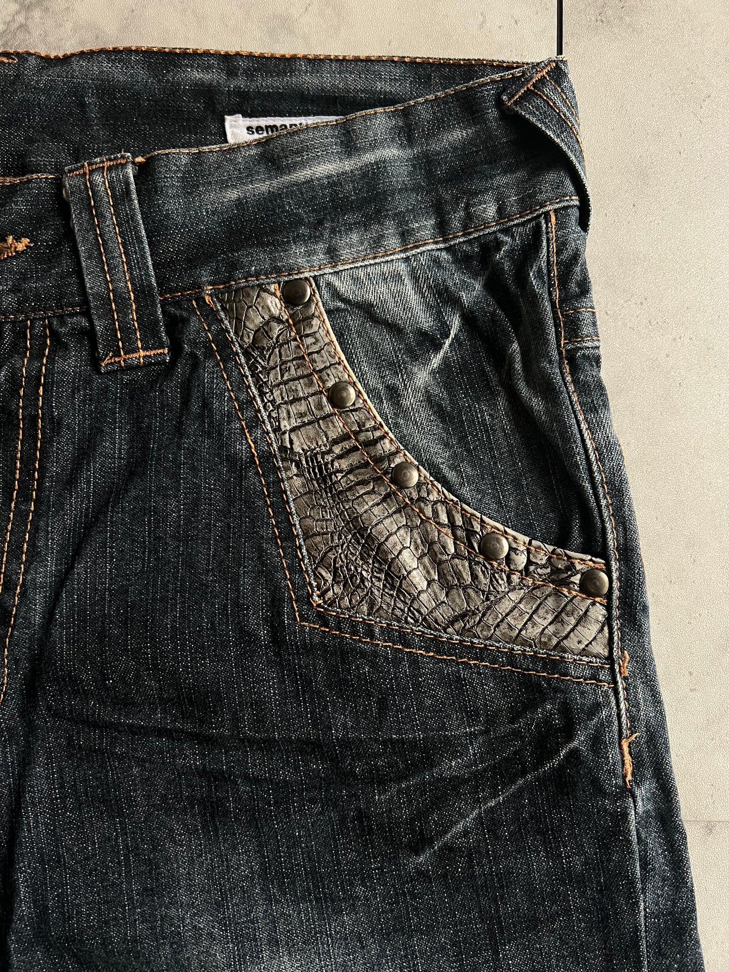 Semantic Design Studded Distressed Crocodile Shorts